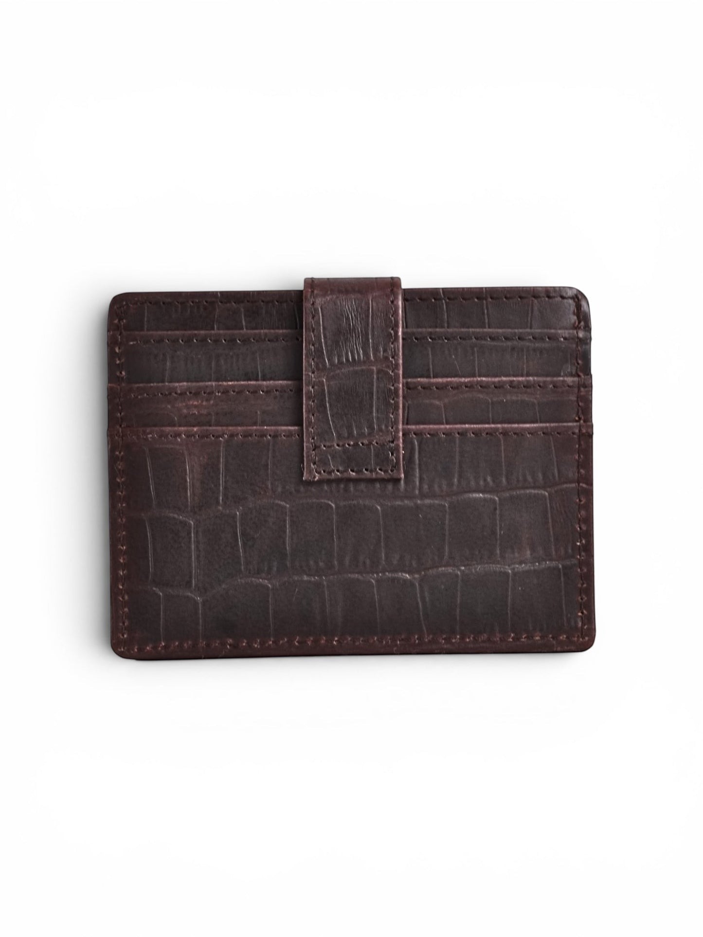 Seragino dark brown croc-texture leather card holder with snap closure and multiple card slots.