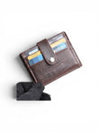Seragino dark brown croc-texture leather card holder with snap closure and multiple card slots.