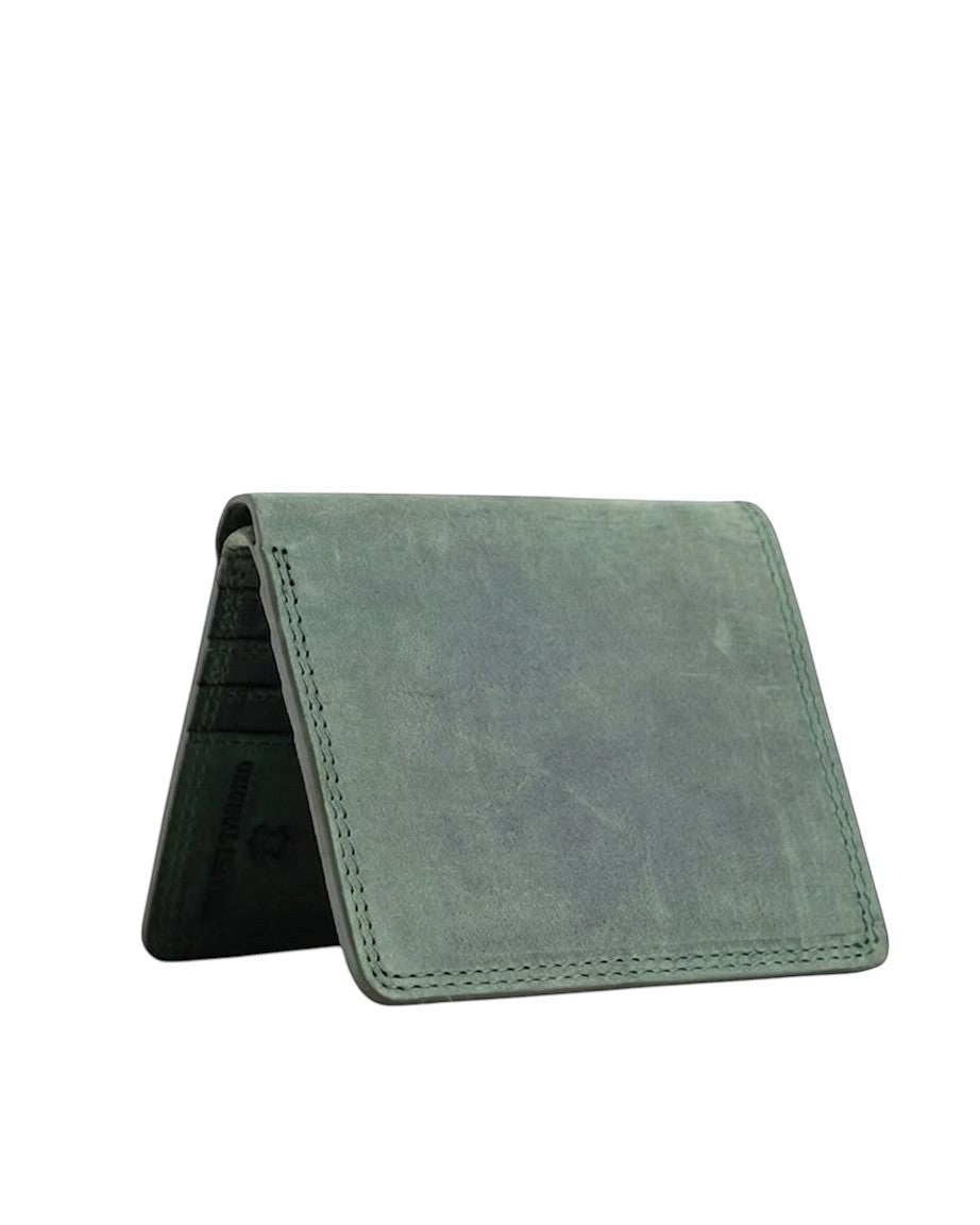 Seragino Verde bifold wallet in distressed green leather with visible stitching and card slots.